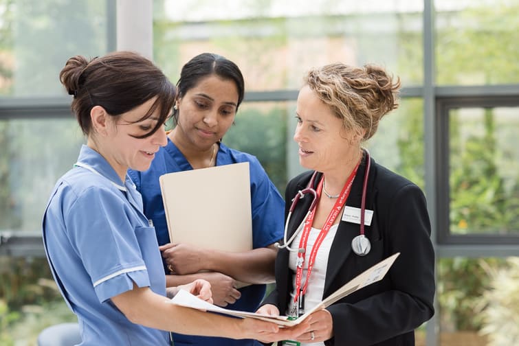 Hospital nursing staff in discussion
