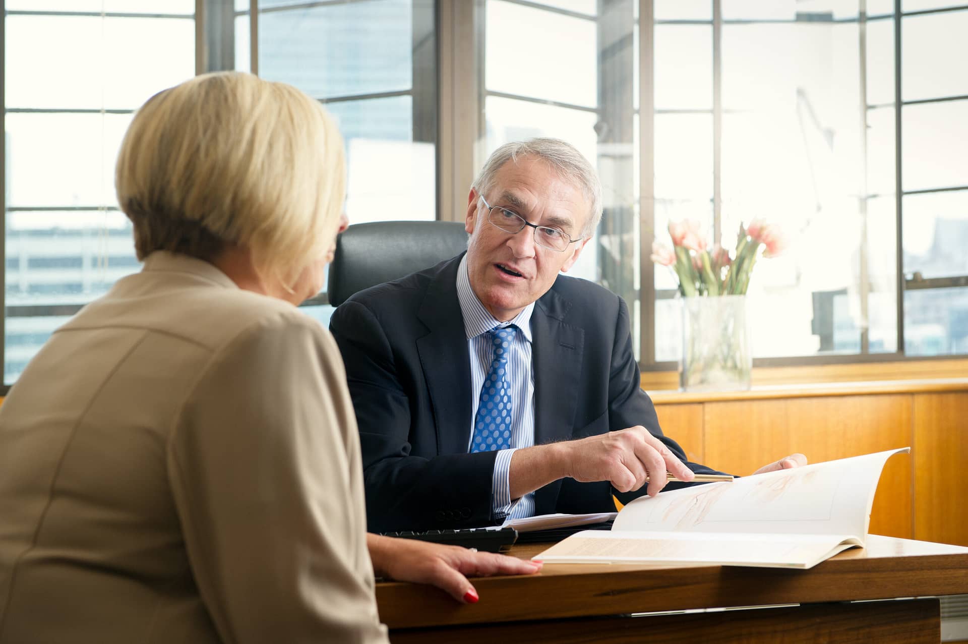 healthcare consultant behind desk